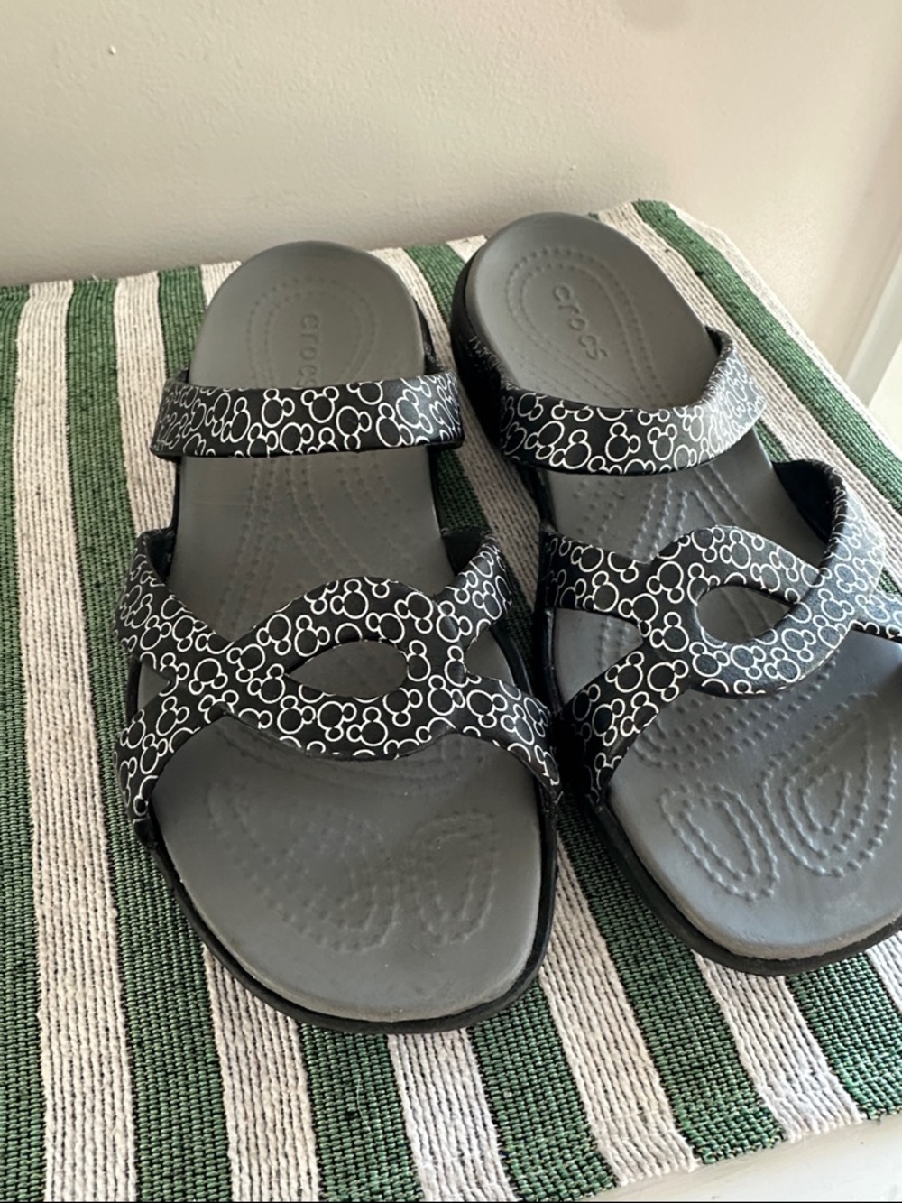 CROCS Black Slide Sandals with Disney Mickey Mouse ear print on straps